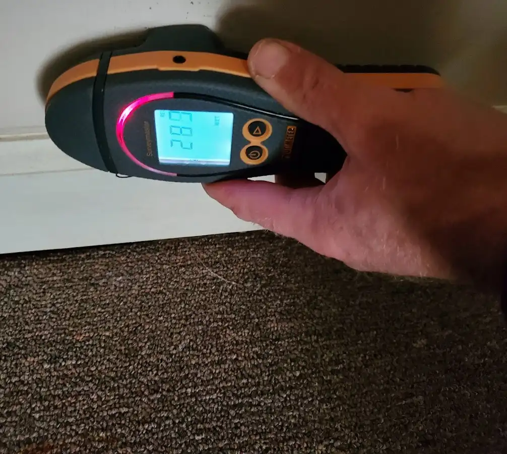 Moisture detection at baseboard during Sewage Cleanup & Sanitation in Ridgecrest